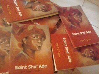 Copies of Paul T. Liam's book Saint Sha' Ade